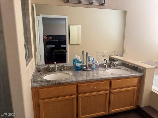 8225 Bermuda Beach Dr, Las Vegas, NV 89128 - bathroom with double vanity and a garden tub
