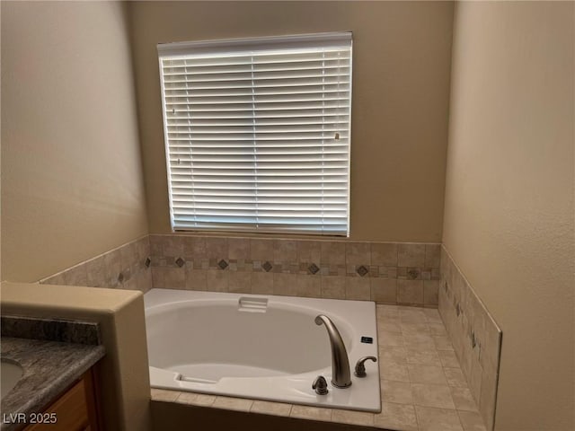 8225 Bermuda Beach Dr, Las Vegas, NV 89128 - bathroom featuring vanity, a bath, and plenty of natural light