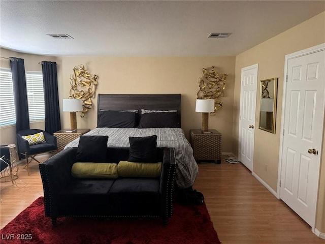 8225 Bermuda Beach Dr, Las Vegas, NV 89128 - bedroom featuring wood finished floors and baseboards