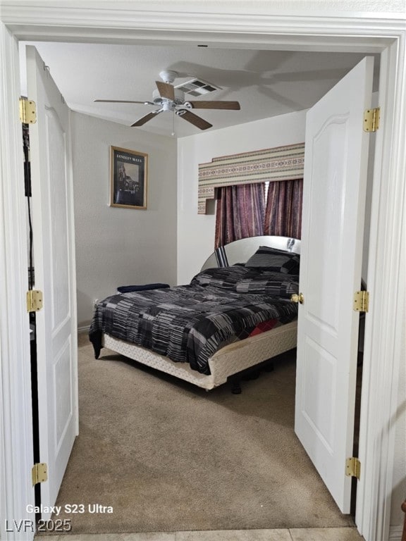 5651 Bettors Luck Ct, Las Vegas, NV 89122 - carpeted bedroom featuring ceiling fan