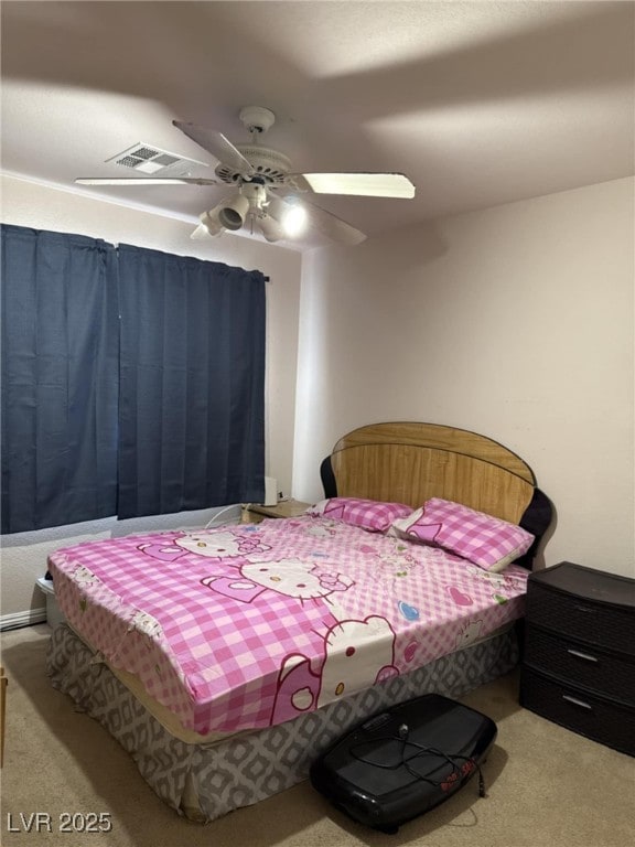 5651 Bettors Luck Ct, Las Vegas, NV 89122 - carpeted bedroom with a ceiling fan