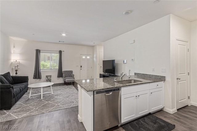 527 Clearsable Ave, Henderson, NV 89044 - kitchen featuring stainless steel dishwasher, open floor plan, a peninsula, stone counters, and recessed lighting