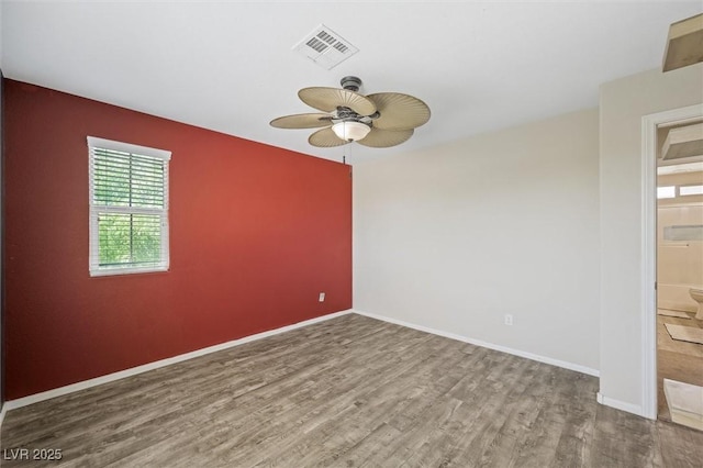 6713 Guidestar St, North Las Vegas, NV 89084 - unfurnished room with ceiling fan and wood finished floors