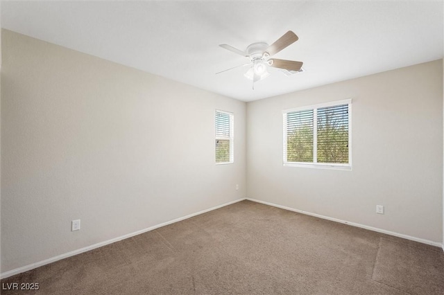 6713 Guidestar St, North Las Vegas, NV 89084 - carpeted empty room with ceiling fan and baseboards