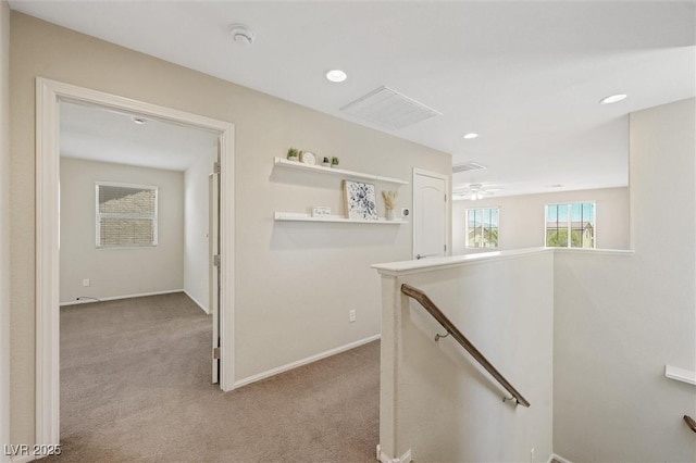 6713 Guidestar St, North Las Vegas, NV 89084 - corridor with an upstairs landing, light colored carpet, and recessed lighting