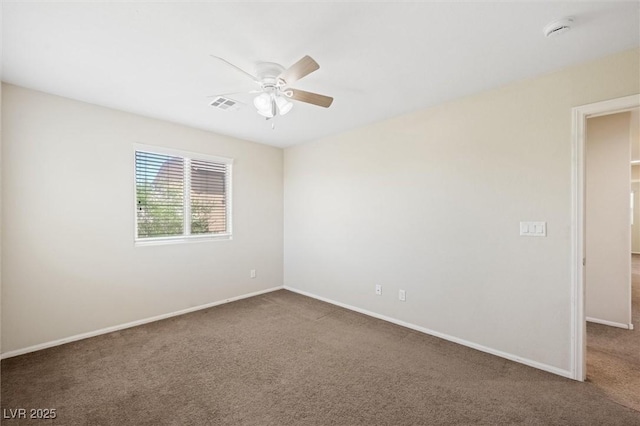 6713 Guidestar St, North Las Vegas, NV 89084 - carpeted spare room featuring a ceiling fan and a smoke detector