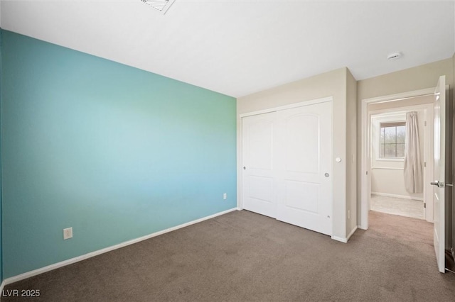 6713 Guidestar St, North Las Vegas, NV 89084 - unfurnished bedroom with carpet floors and a closet