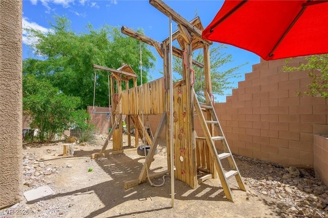 6713 Guidestar St, North Las Vegas, NV 89084 - view of play area featuring a fenced backyard
