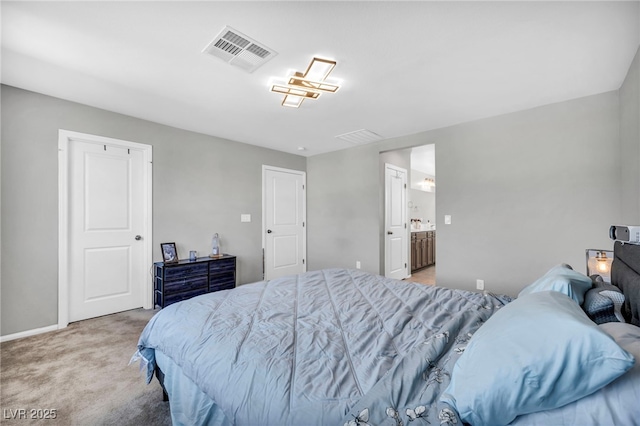 2024 Mystic Wave Rd, North Las Vegas, NV 89031 - bedroom featuring light colored carpet and ensuite bathroom
