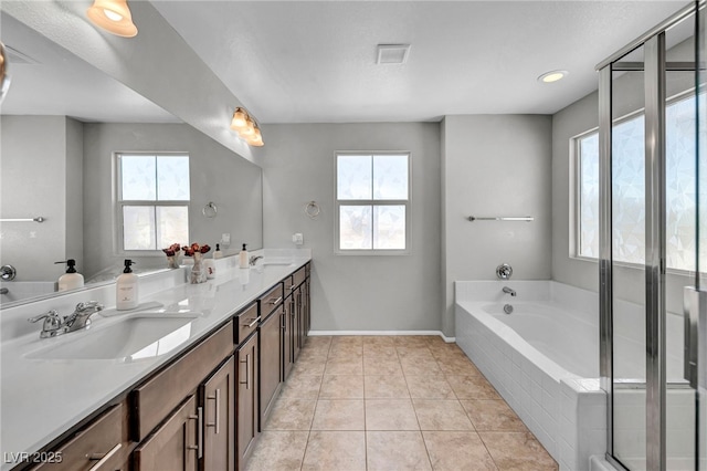 2024 Mystic Wave Rd, North Las Vegas, NV 89031 - full bath with a bath, plenty of natural light, and double vanity