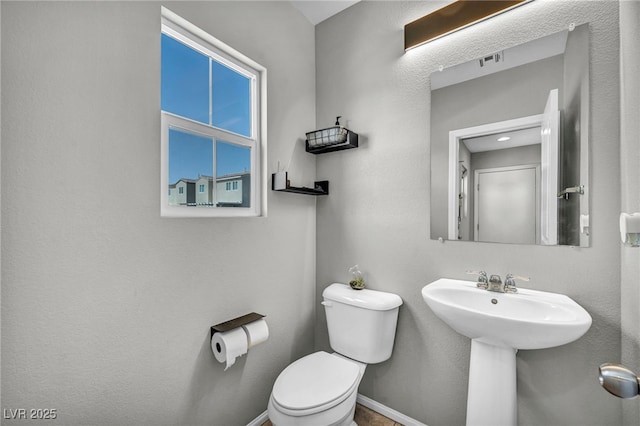 2024 Mystic Wave Rd, North Las Vegas, NV 89031 - half bath featuring toilet and a sink