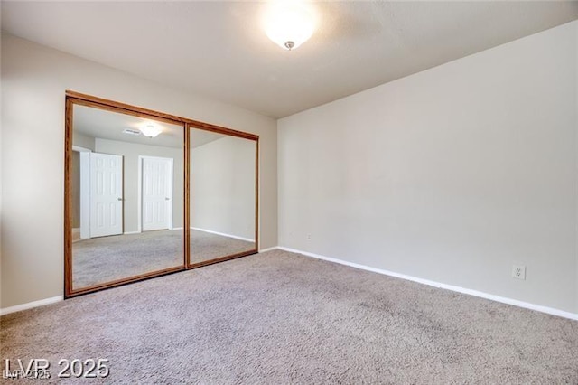 2723 Seabridge Dr, Las Vegas, NV 89121 - unfurnished bedroom featuring carpet and a closet