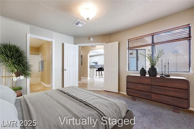 2723 Seabridge Dr, Las Vegas, NV 89121 - bedroom featuring arched walkways and ensuite bath