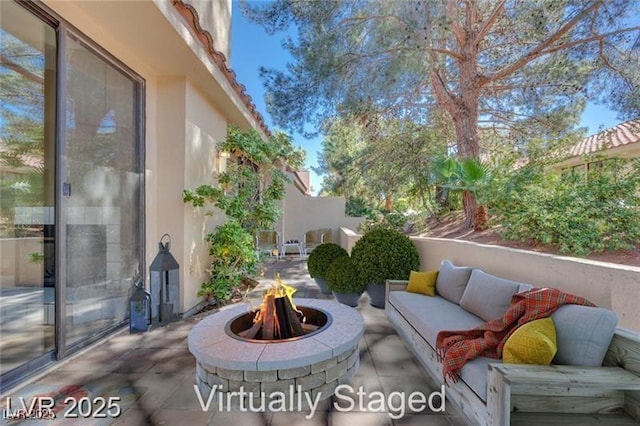 2723 Seabridge Dr, Las Vegas, NV 89121 - view of patio / terrace with an outdoor living space with a fire pit