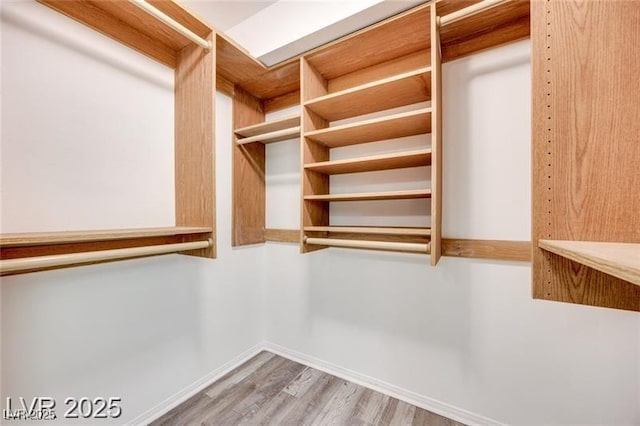 2723 Seabridge Dr, Las Vegas, NV 89121 - walk in closet with wood finished floors