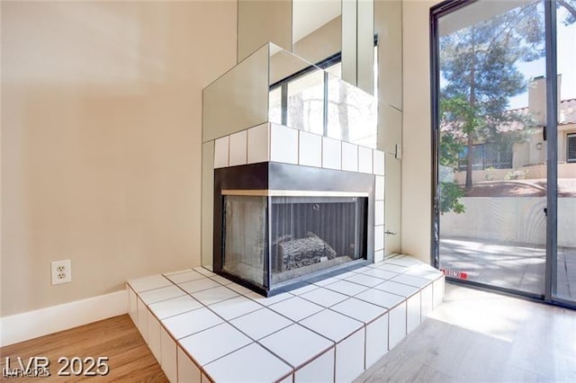 2723 Seabridge Dr, Las Vegas, NV 89121 - detailed view of a fireplace and wood finished floors