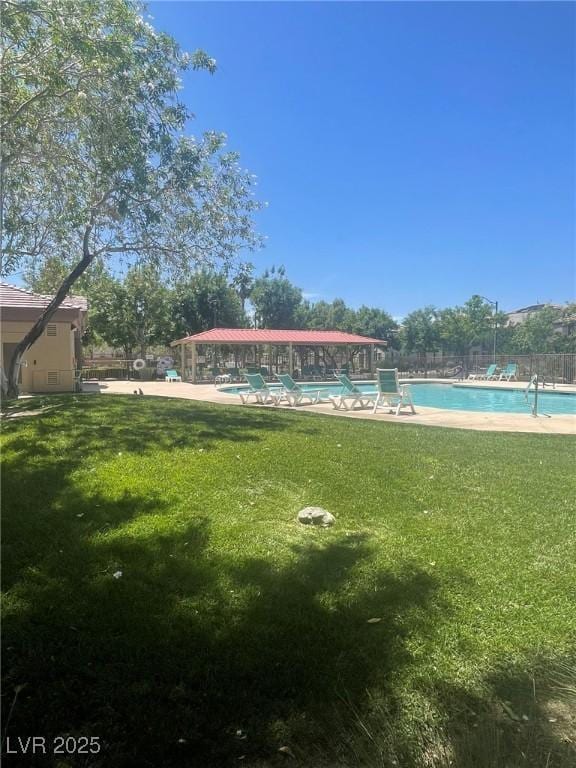 7640 Woven Memories St, Las Vegas, NV 89149 - view of property's community featuring a swimming pool