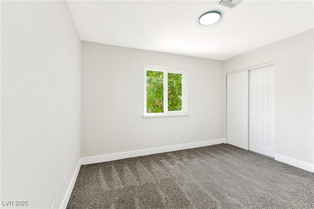 811 Spyglass Ln, Las Vegas, NV 89107 - unfurnished bedroom featuring carpet flooring and a closet