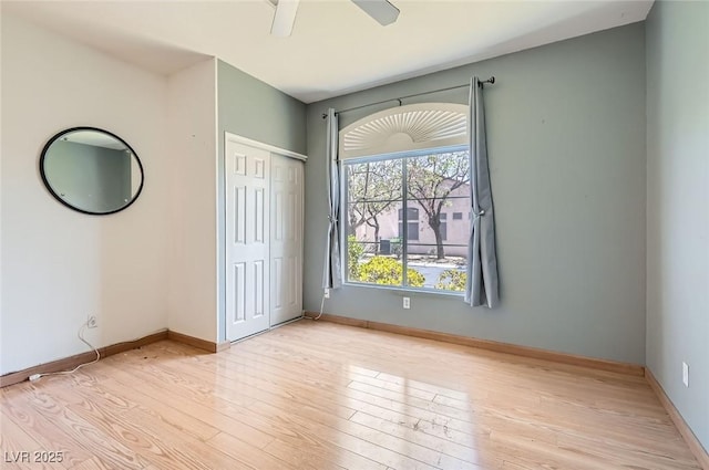 2889 Anteres St, Las Vegas, NV 89117 - unfurnished bedroom featuring light wood finished floors, a closet, and ceiling fan