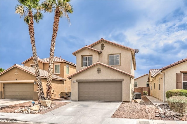 9129 Patrick Henry Ave, Las Vegas, NV 89149 - mediterranean / spanish-style home with stucco siding, driveway, a garage, and a tile roof