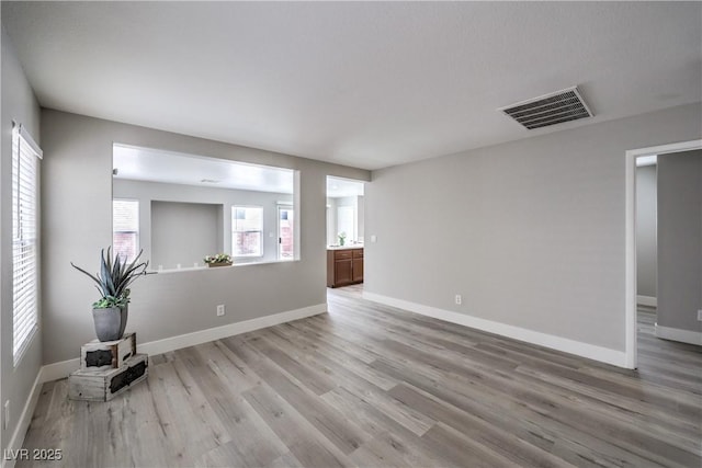 9129 Patrick Henry Ave, Las Vegas, NV 89149 - unfurnished room featuring light wood finished floors and baseboards