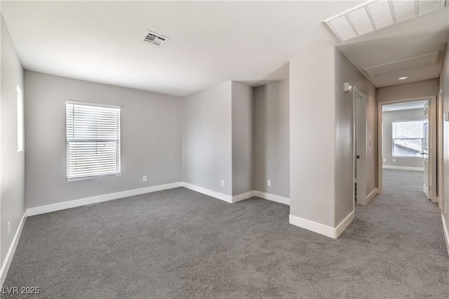 9129 Patrick Henry Ave, Las Vegas, NV 89149 - spare room with carpet flooring and attic access