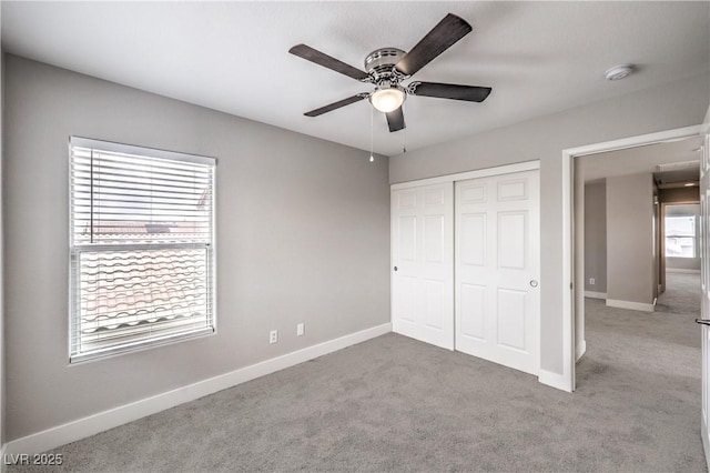 9129 Patrick Henry Ave, Las Vegas, NV 89149 - unfurnished bedroom featuring carpet, a closet, and a ceiling fan