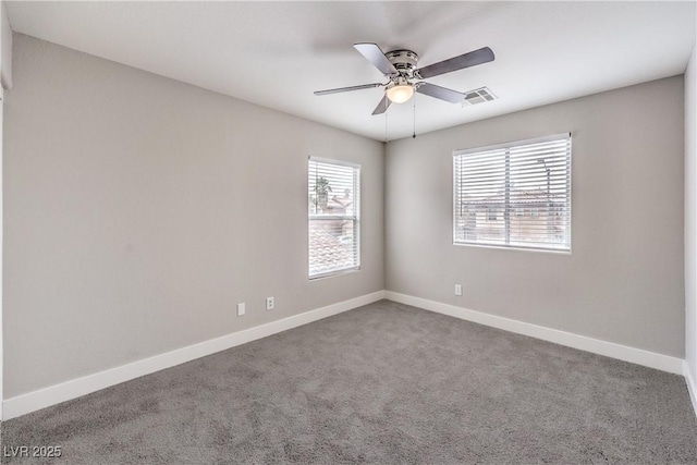 9129 Patrick Henry Ave, Las Vegas, NV 89149 - spare room featuring carpet floors and a ceiling fan