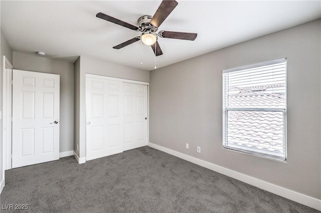 9129 Patrick Henry Ave, Las Vegas, NV 89149 - unfurnished bedroom featuring carpet, a closet, and a ceiling fan