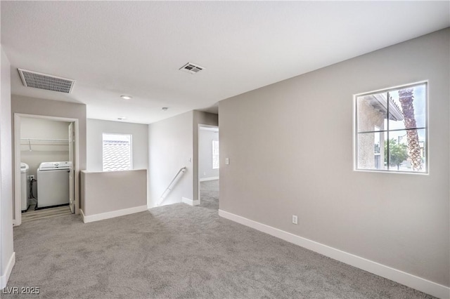 9129 Patrick Henry Ave, Las Vegas, NV 89149 - carpeted empty room featuring washing machine and clothes dryer and baseboards