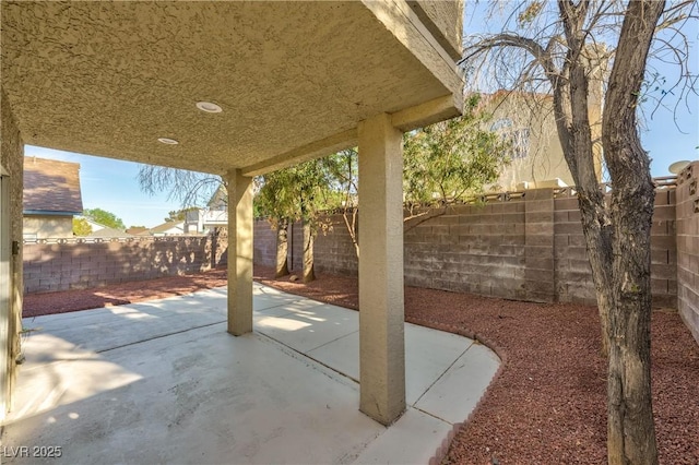 8113 Bay Springs Dr, Las Vegas, NV 89128 - fenced backyard featuring a patio