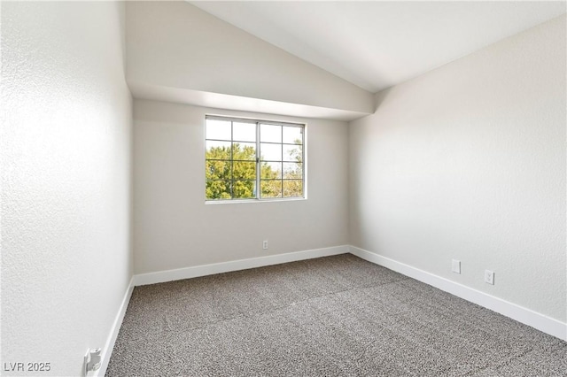 8113 Bay Springs Dr, Las Vegas, NV 89128 - carpeted empty room with baseboards and vaulted ceiling
