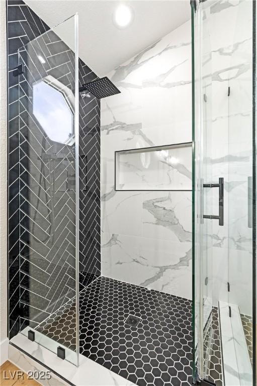 8113 Bay Springs Dr, Las Vegas, NV 89128 - bathroom featuring a marble finish shower and recessed lighting