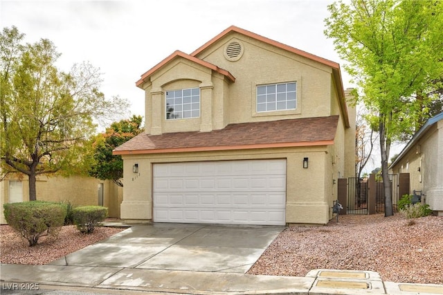 8113 Bay Springs Dr, Las Vegas, NV 89128 - view of front of house with stucco siding, a garage, driveway, and a gate