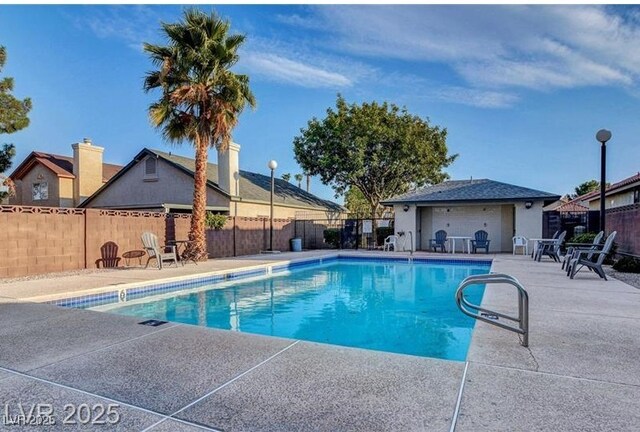 8113 Bay Springs Dr, Las Vegas, NV 89128 - community pool with a patio