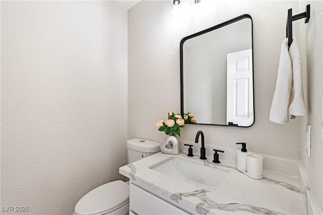 8113 Bay Springs Dr, Las Vegas, NV 89128 - bathroom with vanity and a textured wall