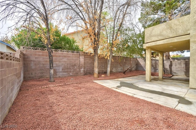 8113 Bay Springs Dr, Las Vegas, NV 89128 - fenced backyard with a patio area