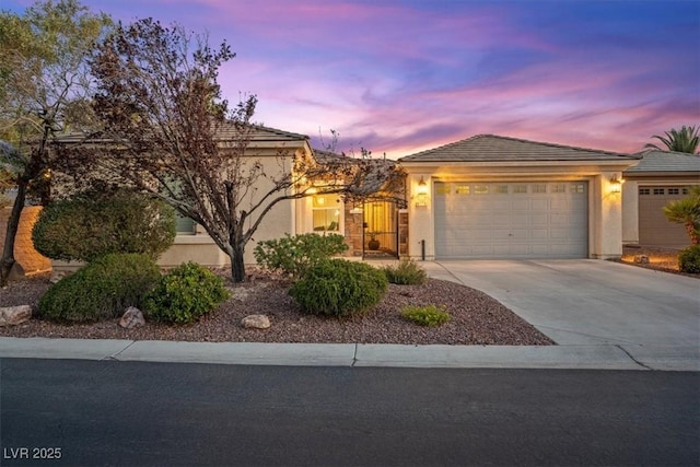 8623 Kennedy Heights Ct, Las Vegas, NV 89131 - single story home featuring stucco siding, a garage, and driveway