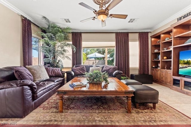 8623 Kennedy Heights Ct, Las Vegas, NV 89131 - living area with plenty of natural light, ornamental molding, ceiling fan, and light tile patterned floors