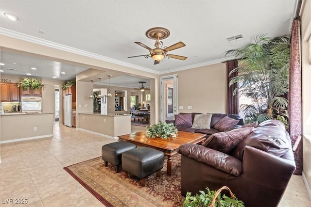 8623 Kennedy Heights Ct, Las Vegas, NV 89131 - living area featuring a ceiling fan, crown molding, and light tile patterned floors