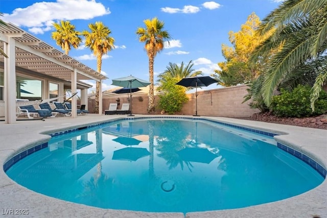 8623 Kennedy Heights Ct, Las Vegas, NV 89131 - view of swimming pool with a pergola, a patio area, and a fenced backyard