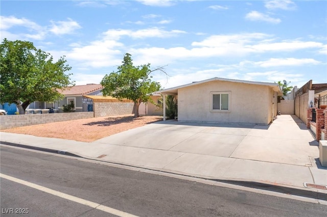 409 Antelope Way, Las Vegas, NV 89145 - ranch-style house with stucco siding and driveway