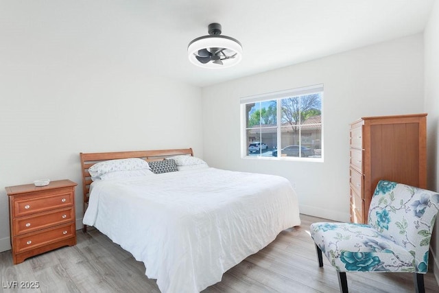 8812 Marble Dr, Las Vegas, NV 89134 - bedroom with light wood finished floors and baseboards