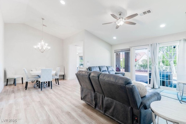 8812 Marble Dr, Las Vegas, NV 89134 - living area featuring vaulted ceiling, ceiling fan, a chandelier, light wood-style floors, and recessed lighting