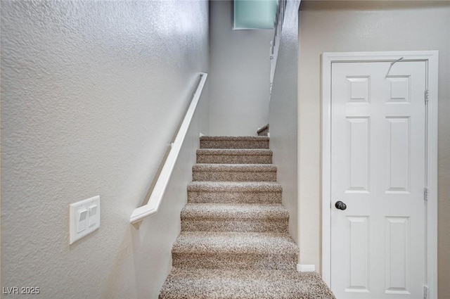 1013 Brinkman St, Las Vegas, NV 89138 - stairway featuring a textured wall and carpet