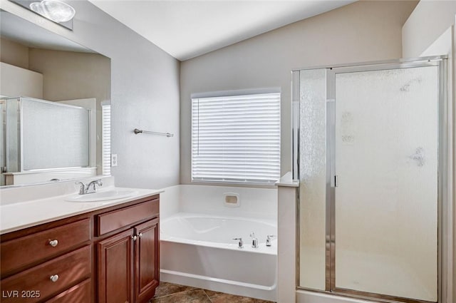 1013 Brinkman St, Las Vegas, NV 89138 - bathroom featuring vanity, a stall shower, a garden tub, and tile patterned flooring