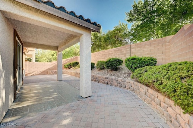 1013 Brinkman St, Las Vegas, NV 89138 - fenced backyard featuring a patio area
