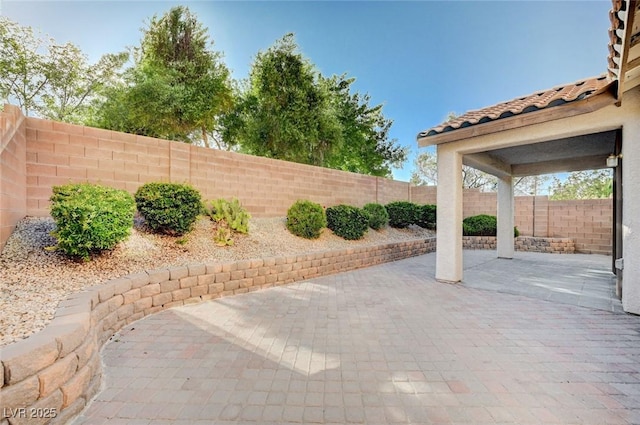 1013 Brinkman St, Las Vegas, NV 89138 - fenced backyard featuring a patio area