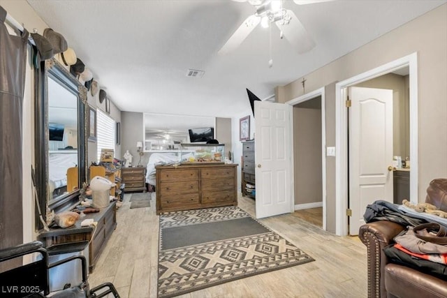 7026 Westpark Ct, Las Vegas, NV 89147 - bedroom featuring light wood-type flooring and ceiling fan
