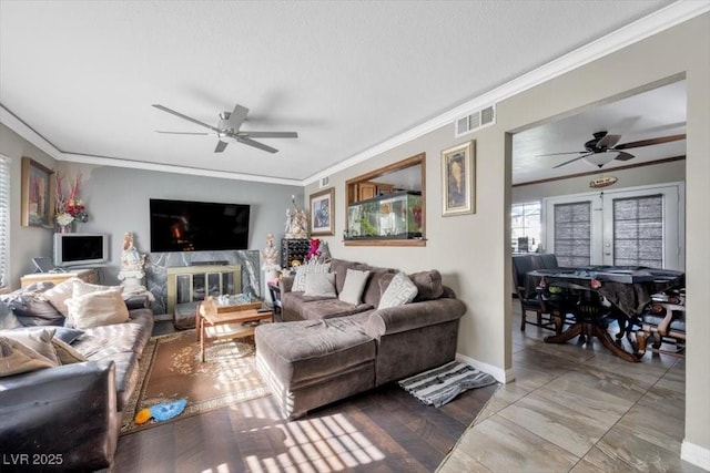 7026 Westpark Ct, Las Vegas, NV 89147 - living room featuring ceiling fan and crown molding